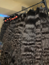 Natural Indian Hair Weft in various wave patterns, ideal for stylish extensions and versatile hairstyles