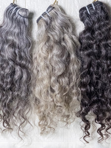 Opulent gray curly hair bundles displayed in various shades for stylish hair extensions