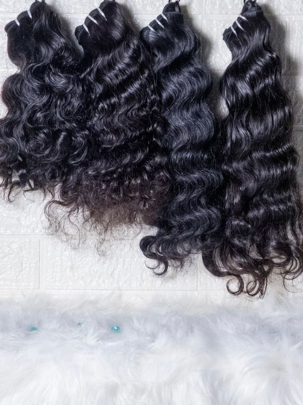Opulent Raw Indian wavy bundles displayed in three different shades for luxurious hairstyles